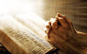praying-hands-on-bible